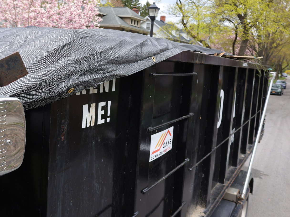 Dumpster covered for pickup