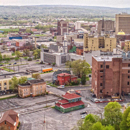 aerial view of a city with trees and buildings